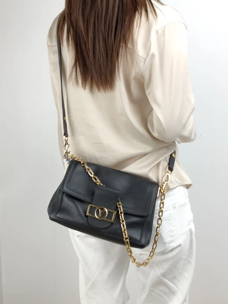 Louis Vuitton Crossbody Bag Dauphine Soft Shoulder Bag Black Calfskin Medium 24 × 9 × 17 cm — on-model view 1 of 2