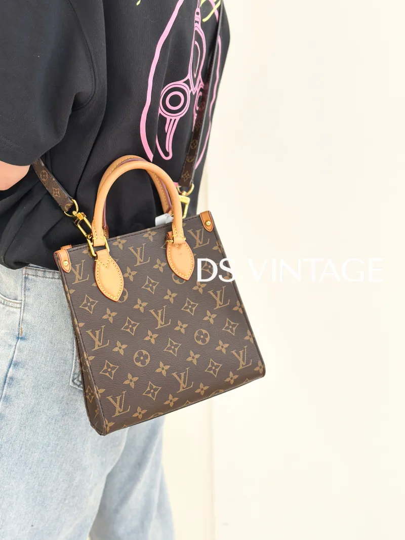 Louis Vuitton Crossbody Bag SAC PLAT BB BB Monogram PVC BB 21.5 × 9 × 22 cm — on-model view 1 of 3