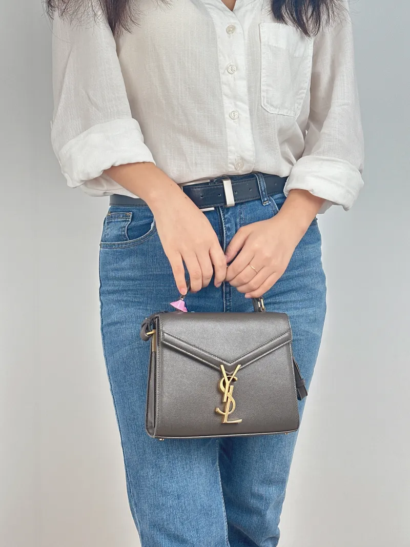 SAINT LAURENT Crossbody Bag Cassandra Shoulder Bag Brown Grained Calfskin Mini 20 × 7.5 × 16 cm — on-model view 1 of 2
