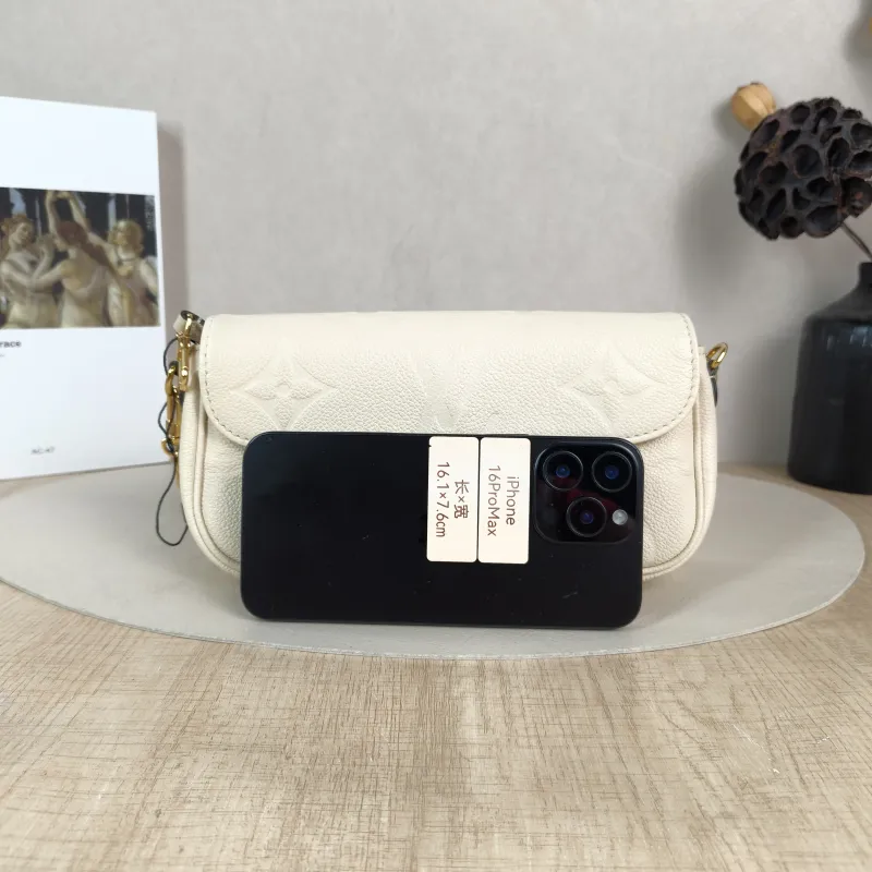 Louis Vuitton Crossbody Bag IVY White Monogram Empreinte Embossed Calfskin Small 23.5 × 4.3 × 12 cm — cover view 2 of 5