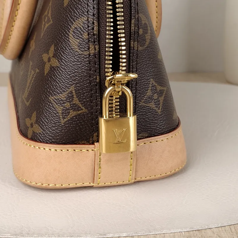 Louis Vuitton Crossbody Bag Alma BB Monogram PVCBB23.5 × 11.5 × 17.5 cm — detail view 2 of 14