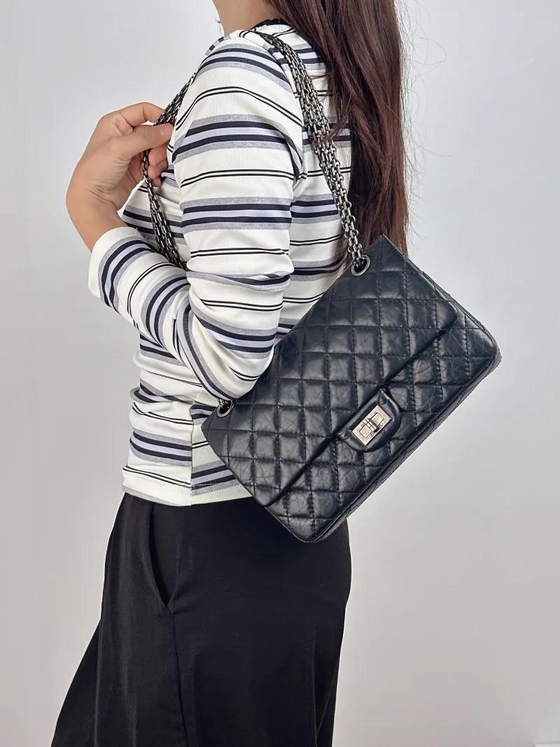 Chanel Shoulder Bag 2.55 Black Calfskin Small 24 × 7.5 × 16 cm 18 — on-model view 2 of 2