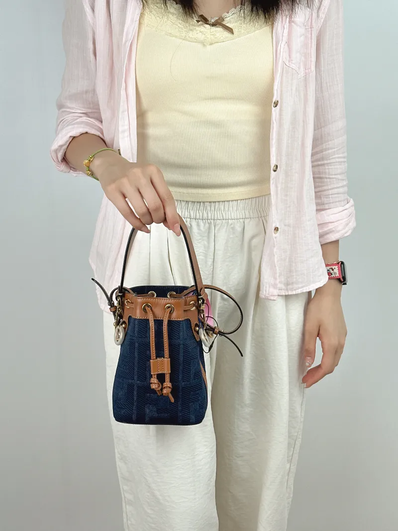FENDI Crossbody Bag Mon Tresor Bucket Bag Blue Brown Calfskin，Canvas Mini 12 × 10 × 18 cm — on-model view 2 of 2