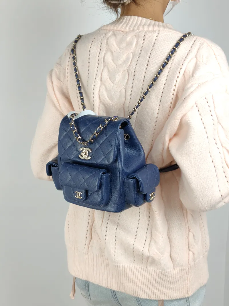 Chanel Backpack duma Navy Grained Calfskin Small 18 × 9.5 × 19 cm — on-model view 3 of 3