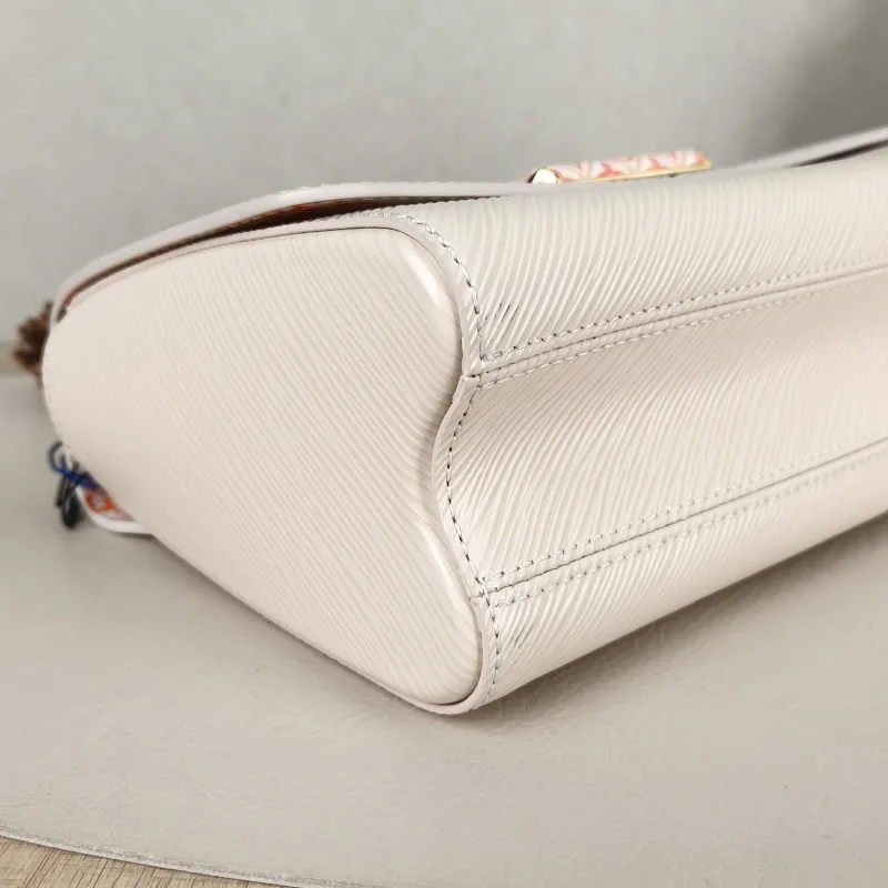 Louis Vuitton Crossbody Bag Twist White Epi Embossed Calfskin Pink 23 × 9.5 × 17 cm — detail view 11 of 14