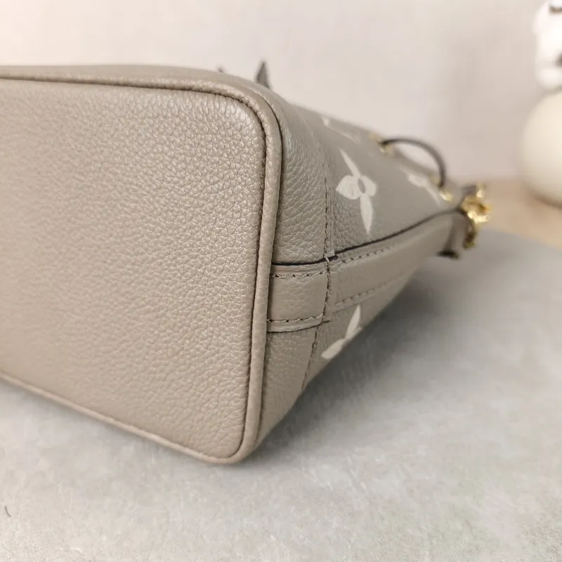 Louis Vuitton Crossbody Bag NANO NOÉ Bucket Bag Nano · White Monogram Empreinte Embossed Calfskin nano 13 × 10 × 16 cm — detail view 9 of 10