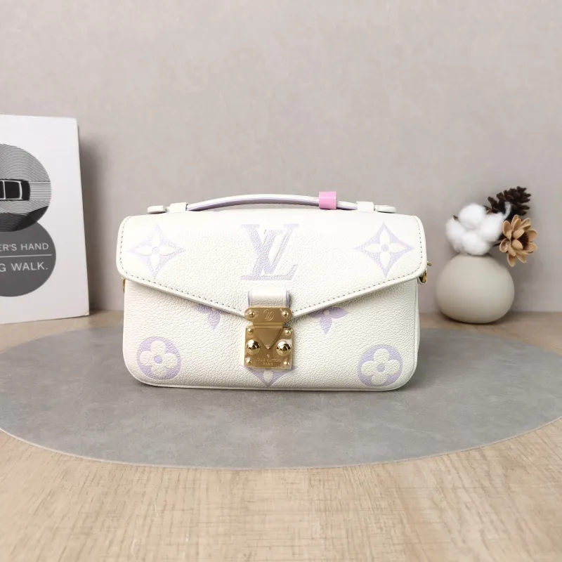 Louis Vuitton Crossbody Bag Pochette Métis East West White · Monogram Empreinte Embossed Calfskin Small 21.5 × 6 × 13.5 cm