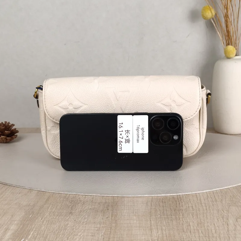 Louis Vuitton Crossbody Bag IVY White Monogram Empreinte Embossed Calfskin Small 23.5 × 4.3 × 12 cm — cover view 3 of 6