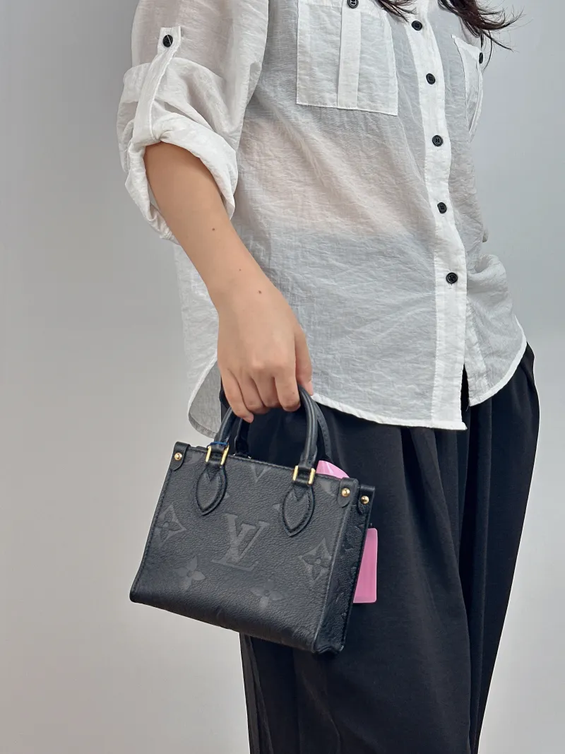 Louis Vuitton Crossbody Bag Onthego BB Black Empreinte Embossed Calfskin BB 18 × 8.5 × 15 cm — on-model view 2 of 2