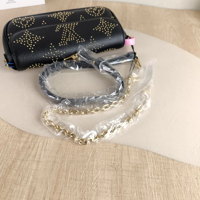 Louis Vuitton Crossbody Bag IVY Black Monogram Empreinte Embossed Calfskin Small 23.5 × 4.3 × 12 cm — detail view 10 of 11