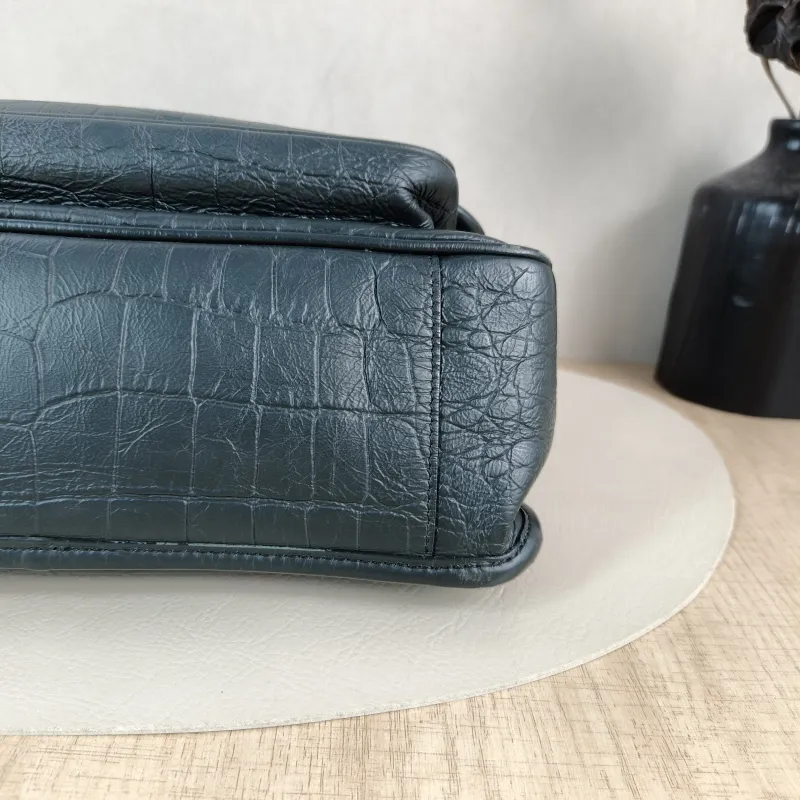 SAINT LAURENT Crossbody Bag Niki D Green Waxed Leather Medium 28 × 8.5 × 20 cm — detail view 2 of 11