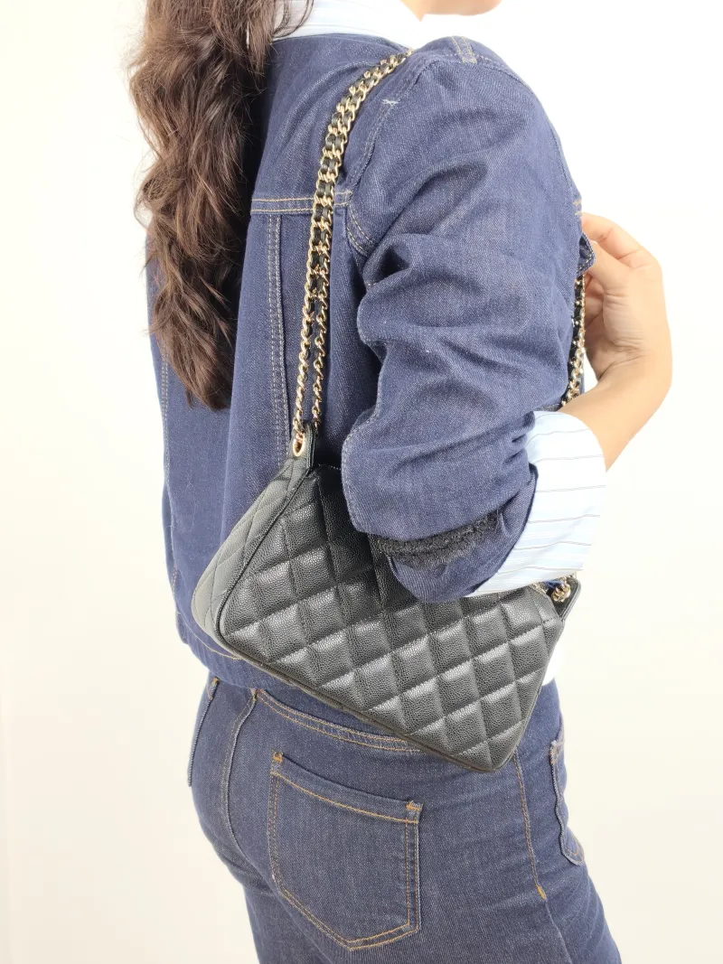 Chanel Crossbody Bag Black Grained Calfskin 21 × 5.5 × 12 cm — on-model view 2 of 2