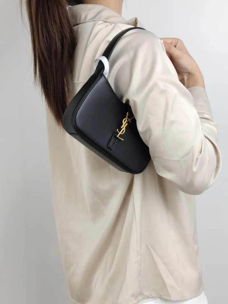 SAINT LAURENT Shoulder Bag LE 5 À 7 Black Calfskin Mini 19 × 4.5 × 11.5 cm — on-model view 1 of 2
