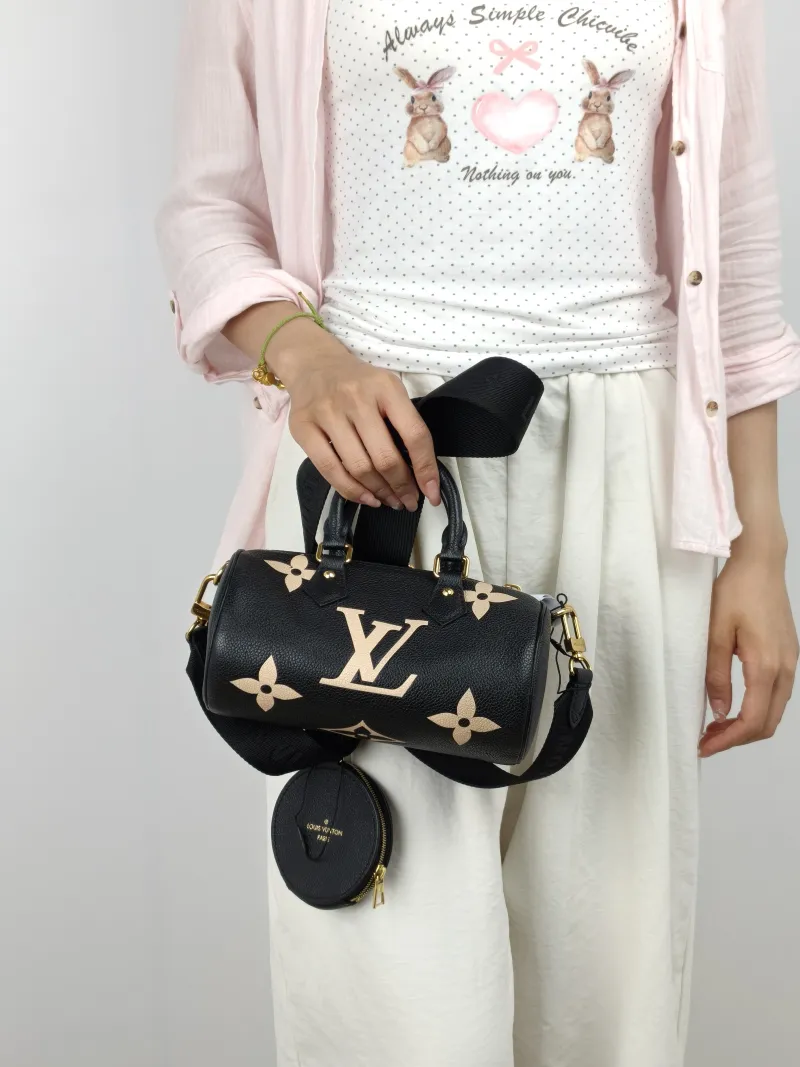 Louis Vuitton Crossbody Bag Papillon Black · White Monogram Empreinte Embossed Calfskin BB 20 × 10 × 10 cm — on-model view 2 of 3