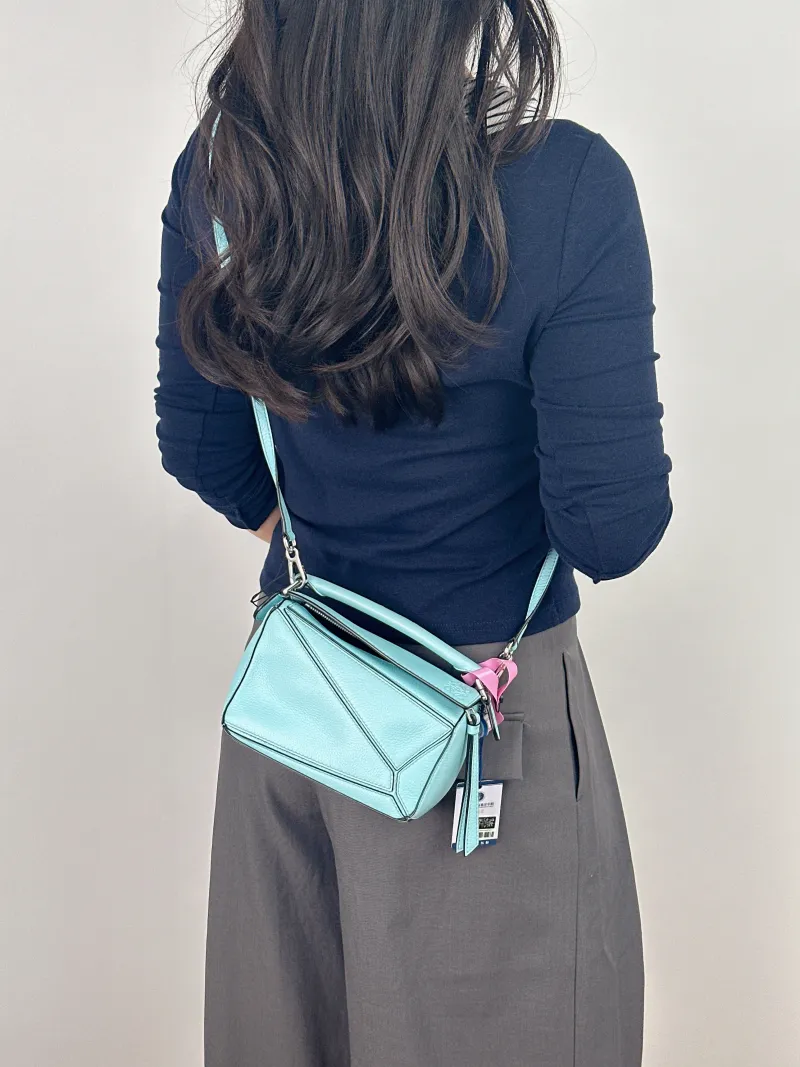 LOEWE Crossbody Bag Puzzle Blue Calfskin Mini 18 × 8 × 12.5 cm — on-model view 2 of 2