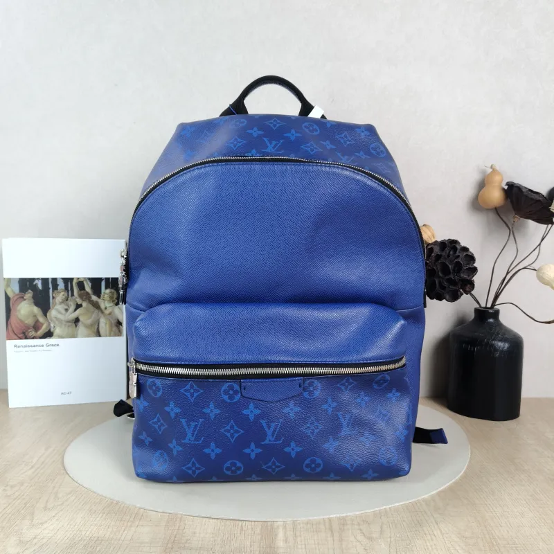 Louis Vuitton Backpack Discovery Backpack Blue PVC · Calfskin Small 37 × 20 × 40 cm
