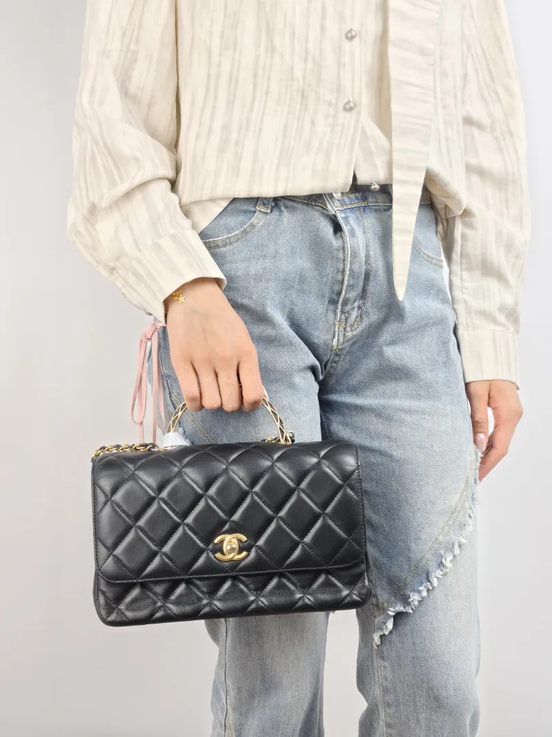 Chanel Crossbody Bag Black with Gold-Tone Hardware Lambskin One Size 25 × 10 × 16 cm — on-model view 1 of 2