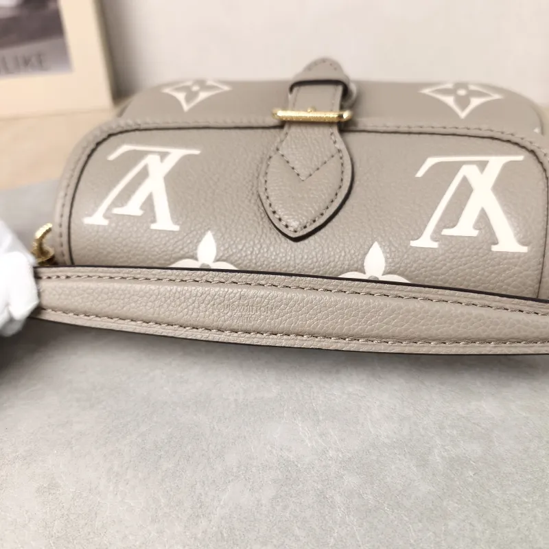 Louis Vuitton Crossbody Bag Diane Baguette Bag Empreinte Embossed Calfskin nano 19 × 6 × 10.5 cm — detail view 6 of 14