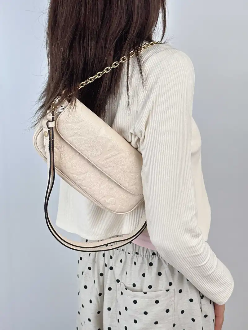 Louis Vuitton Crossbody Bag IVY White Monogram Empreinte Embossed Calfskin Small 23.5 × 4.3 × 12 cm — on-model view 1 of 2