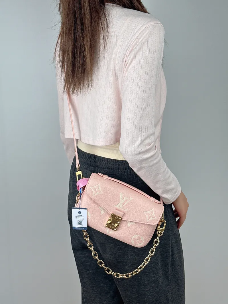 Louis Vuitton Crossbody Bag Pochette Métis East West Empreinte Embossed Calfskin Monogram Small21.5 × 6 × 13.5 cm — on-model view 2 of 2