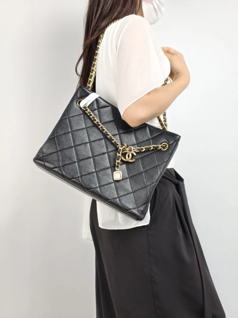 Chanel Shoulder Bag Tote Bag Black Lambskin One Size 30 × 10 × 23 cm — on-model view 2 of 2