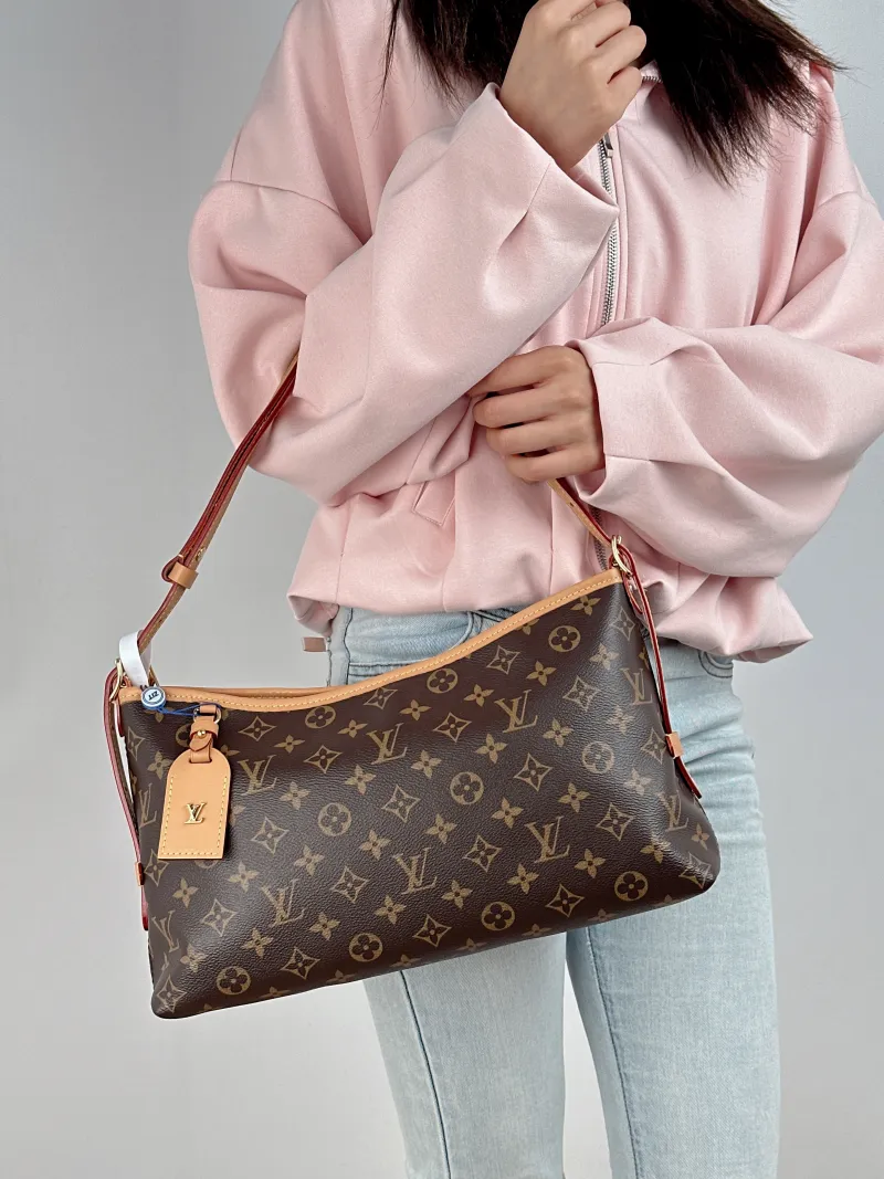 Louis Vuitton Shoulder Bag Carryall East West Monogram PVC One Size 36 × 10 × 19 cm — on-model view 3 of 3