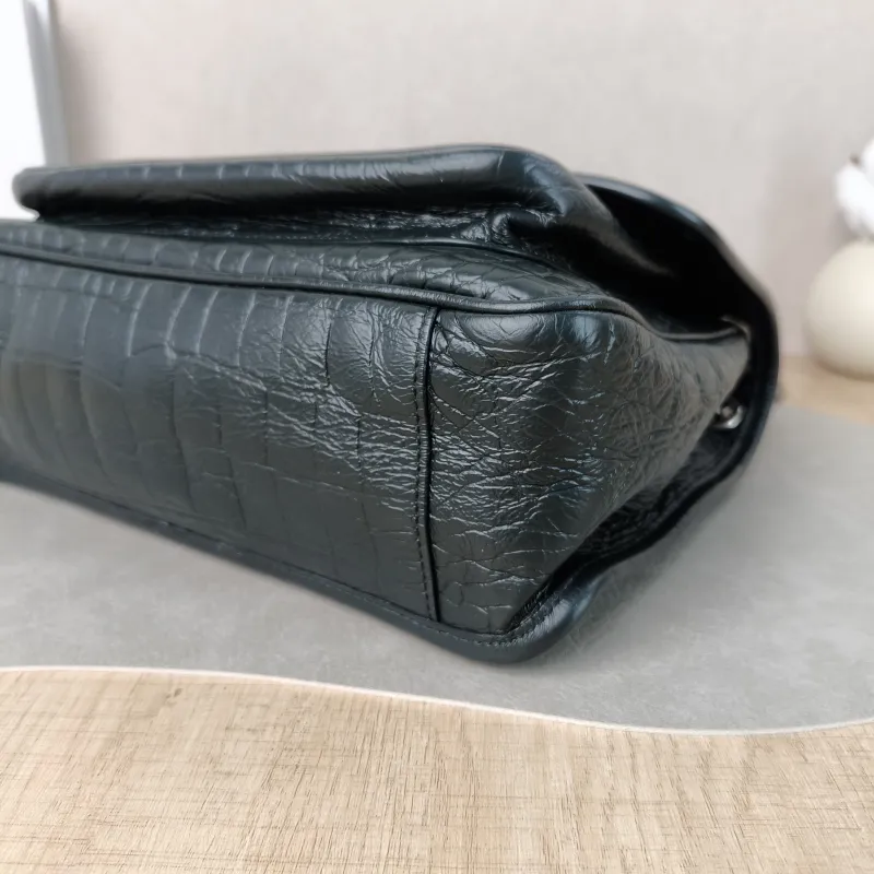 SAINT LAURENT Crossbody Bag Niki D Green Calfskin Medium 28 × 8.5 × 20 cm — detail view 2 of 11