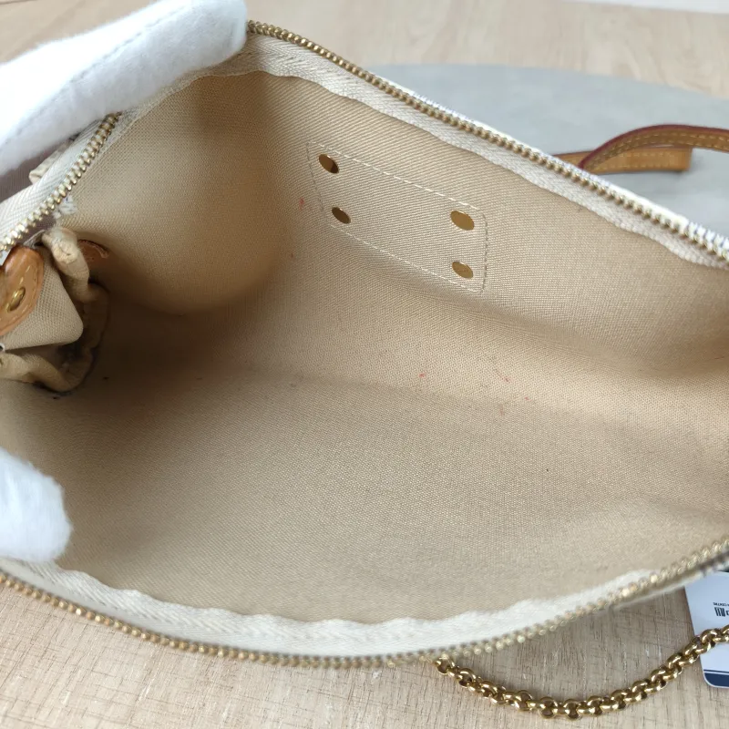 Louis Vuitton Crossbody Bag Eva PVC Small 25 × 4 × 13 cm — detail view 9 of 14