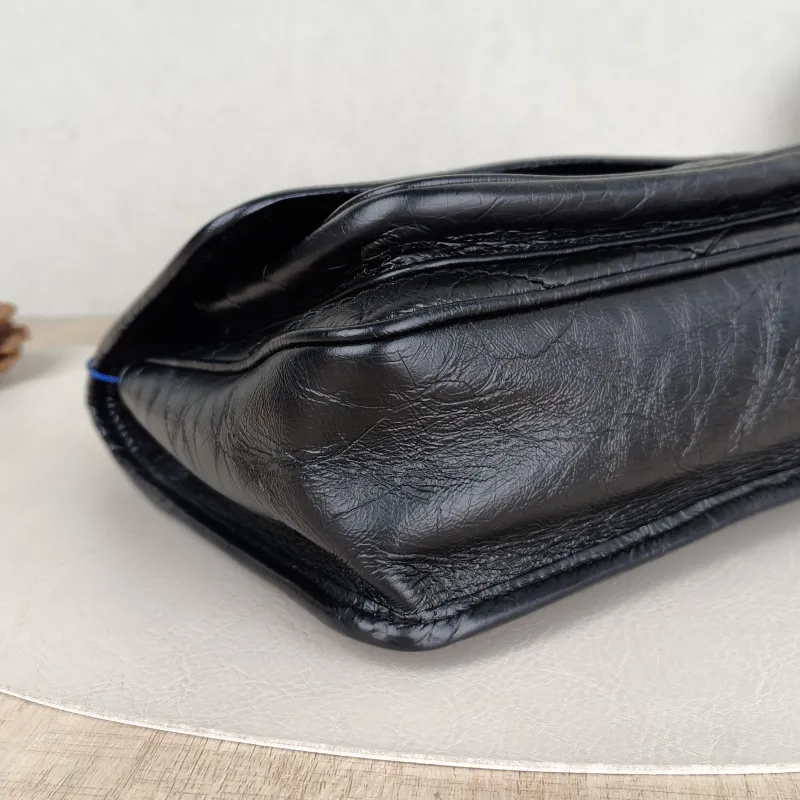 SAINT LAURENT Crossbody Bag Niki Black Waxed Leather Calfskin Small 21 × 7.5 × 16 cm — detail view 4 of 13