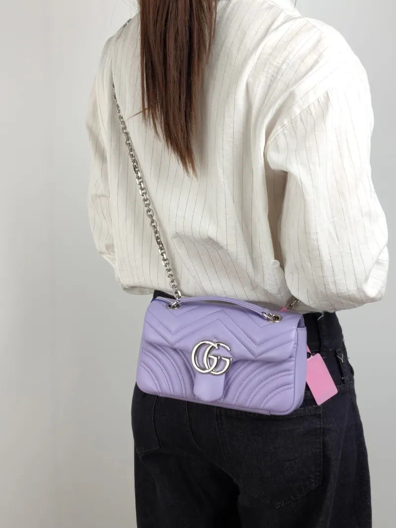 GUCCI Crossbody Bag GG Marmont Small Marmont 22 Lambskin Small 22 × 6 × 13 cm — on-model view 1 of 2