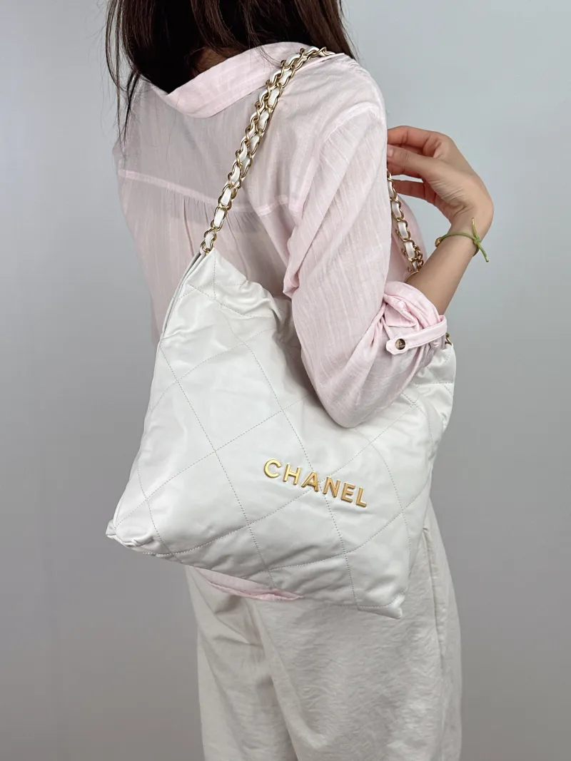 Chanel Shoulder Bag22Bag White CC alfskin Small35 × 7 × 37 cm — on-model view 1 of 2