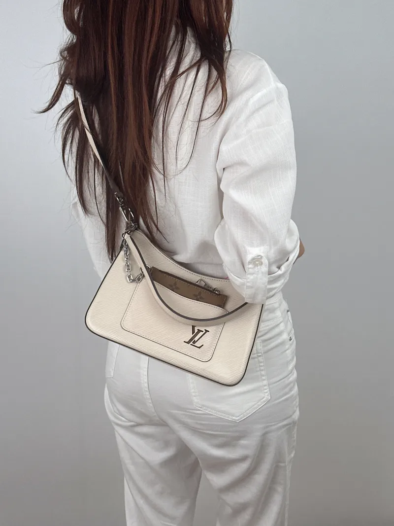 Louis Vuitton Crossbody Bag MARELLE White Epi Embossed Calfskin Small 25 × 8 × 15 cm — on-model view 1 of 2