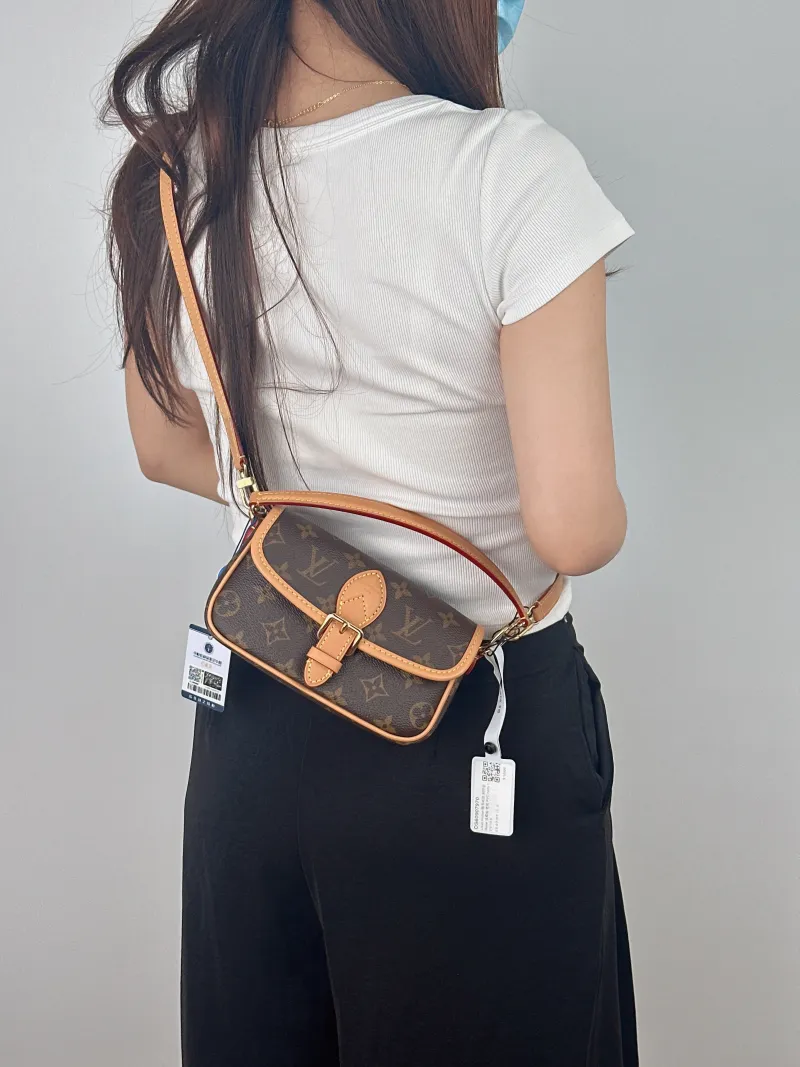 Louis Vuitton Crossbody Bag Diane Baguette Bag Monogram PVC nano 19 × 6 × 10.5 cm — on-model view 2 of 2