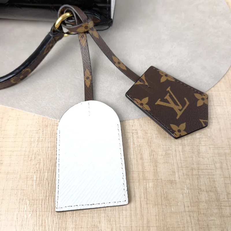 Louis Vuitton Crossbody Bag Spring Street Black Patent Leather · PVC 17 × 8.5 × 16 cm — detail view 12 of 14
