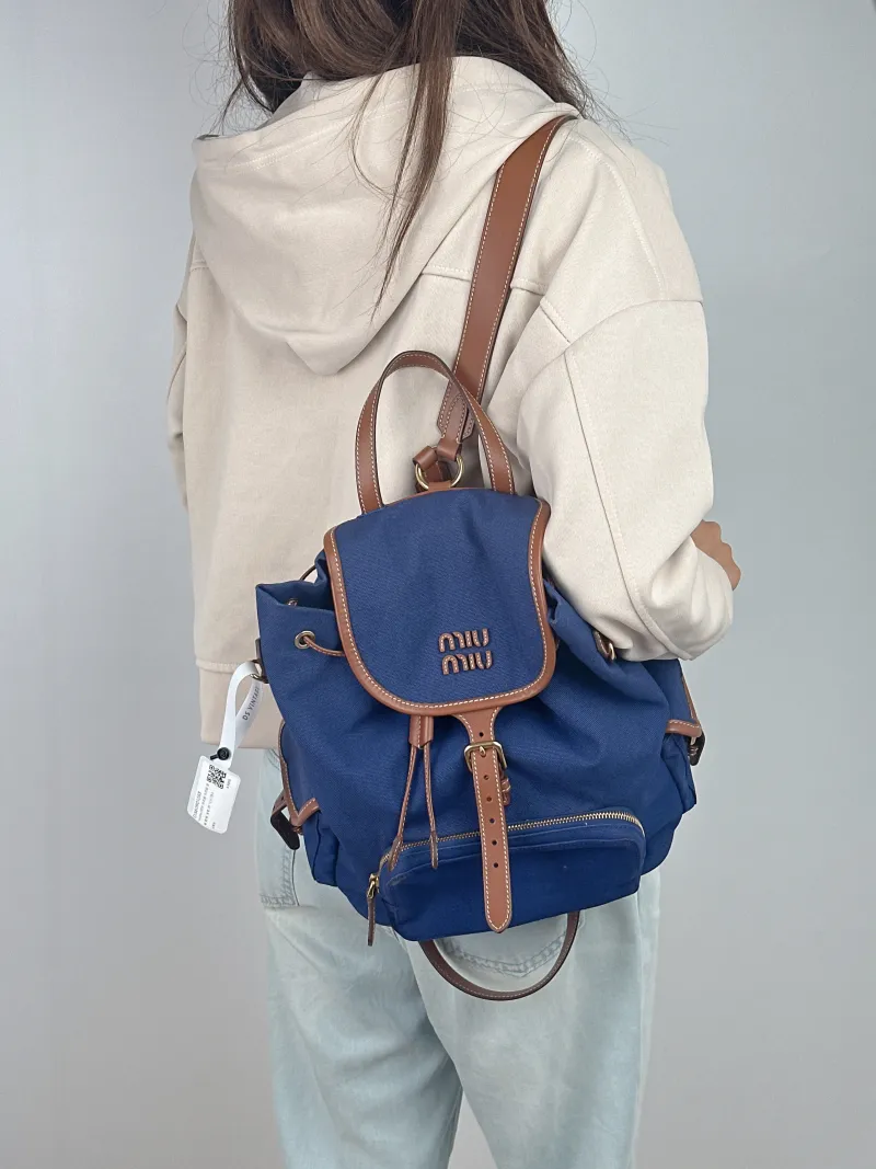 Miumiu Backpack Backpack Blue Canvas Large 25 × 12.5 × 29.5 cm — on-model view 3 of 3