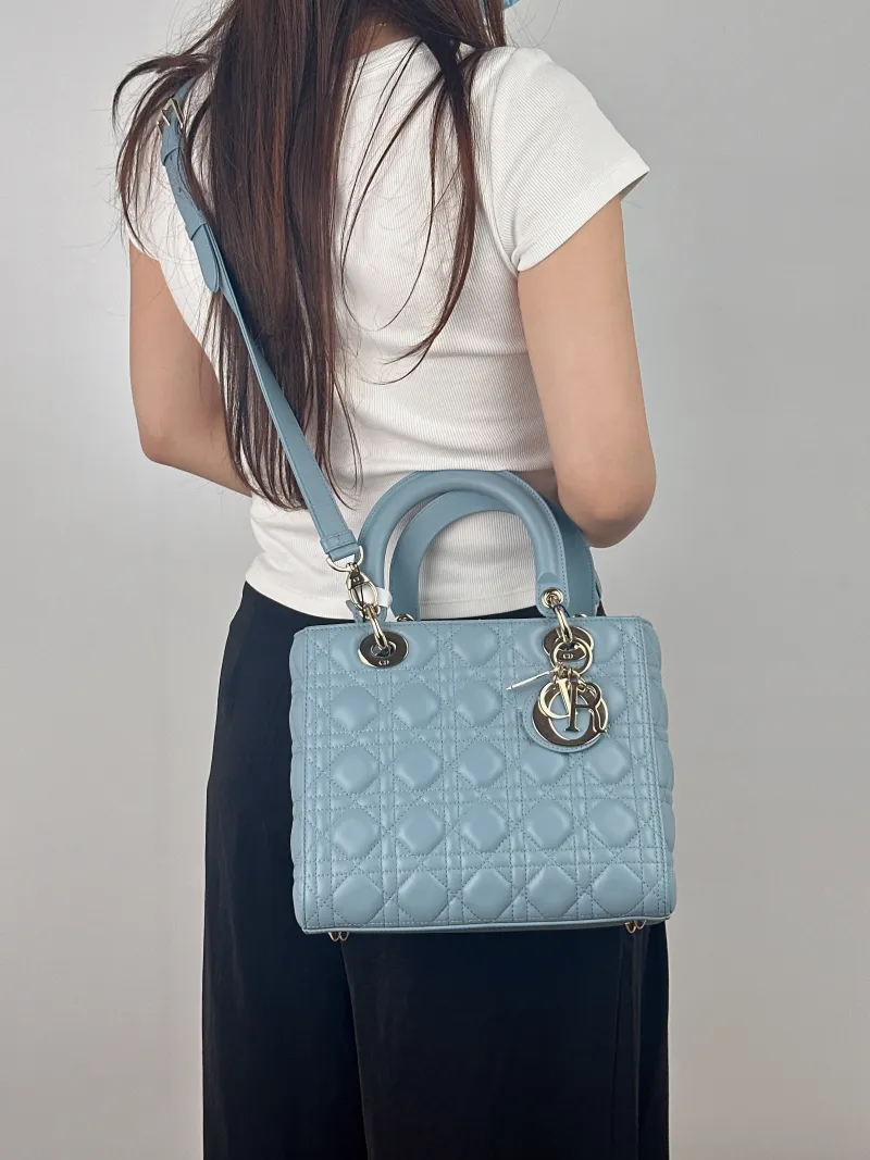 DIOR Top Handle Bag Lady Lady Dior Bag Blue Lambskin Medium 24 × 12 × 21 cm — on-model view 2 of 2
