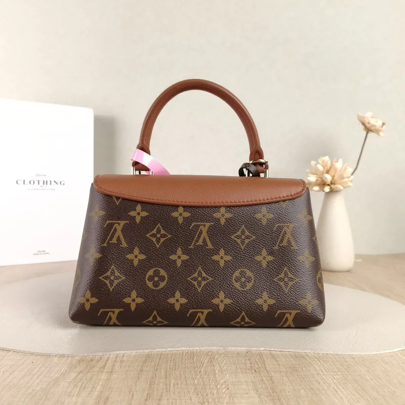 Louis Vuitton Crossbody Bag MADELEINE PVC · Calfskin BB 24.5 × 8 × 16 cm — cover view 2 of 5