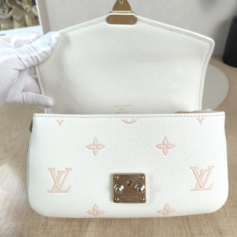 Louis Vuitton Crossbody Bag Pochette Métis East West White · Pink Monogram Empreinte Embossed Calfskin Small 21.5 × 6 × 13.5 cm — detail view 8 of 13