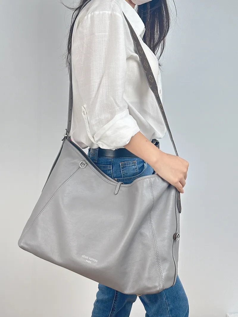 Louis Vuitton Crossbody Bag Carryall Vibe Grey SL ambskin Medium 39 × 15 × 30 cm — on-model view 1 of 2
