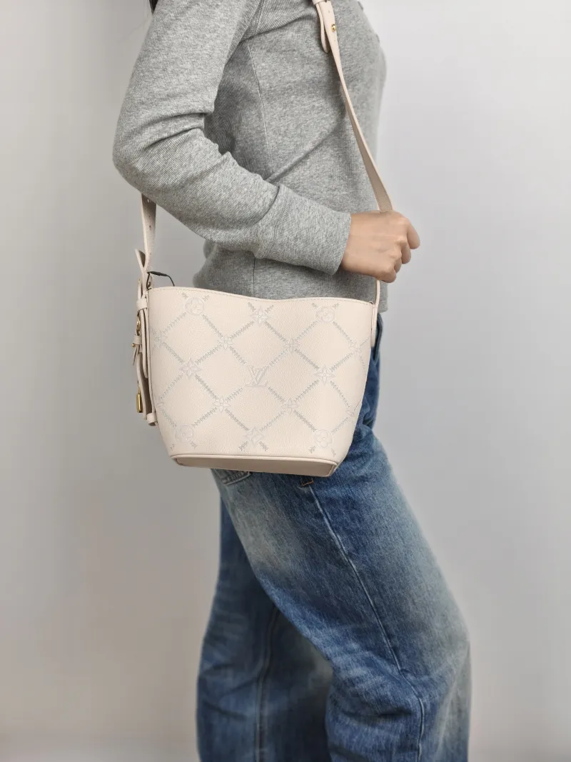 Louis Vuitton Top Handle Bag ALL IN BB White · Blue Calfskin BB 16 × 12 × 18 cm — on-model view 2 of 3