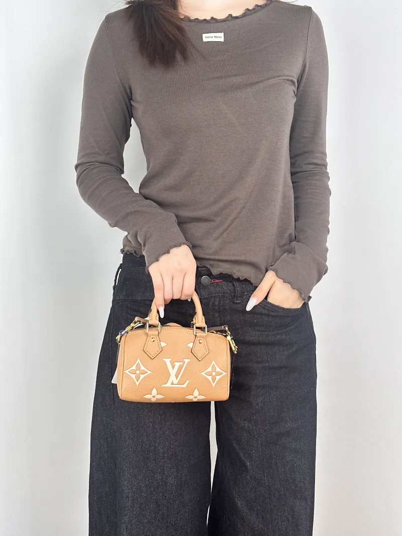 Louis Vuitton Crossbody Bag Speedy Nano · White Empreinte Embossed Calfskinnano16 × 7.5 × 10 cm — on-model view 2 of 3