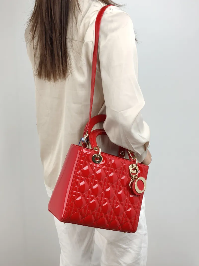 DIOR Top Handle Bag Lady Lady Dior Bag Red Patent Leather Medium 24 × 12 × 21 cm — on-model view 2 of 2