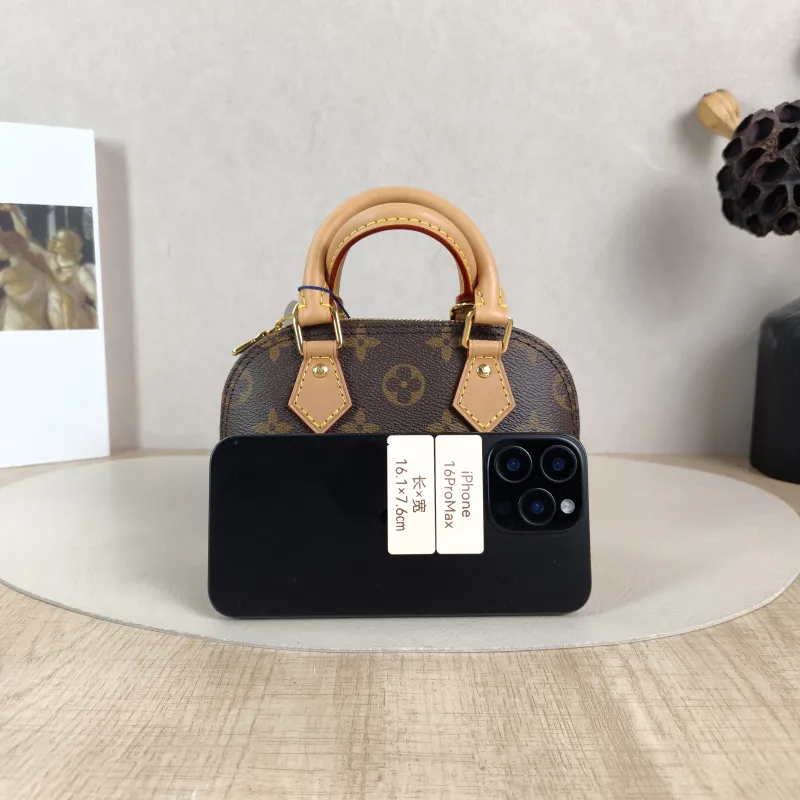 Louis Vuitton Crossbody Bag Alma Nano Monogram PVC nano 18 × 8 × 12 cm — cover view 2 of 5