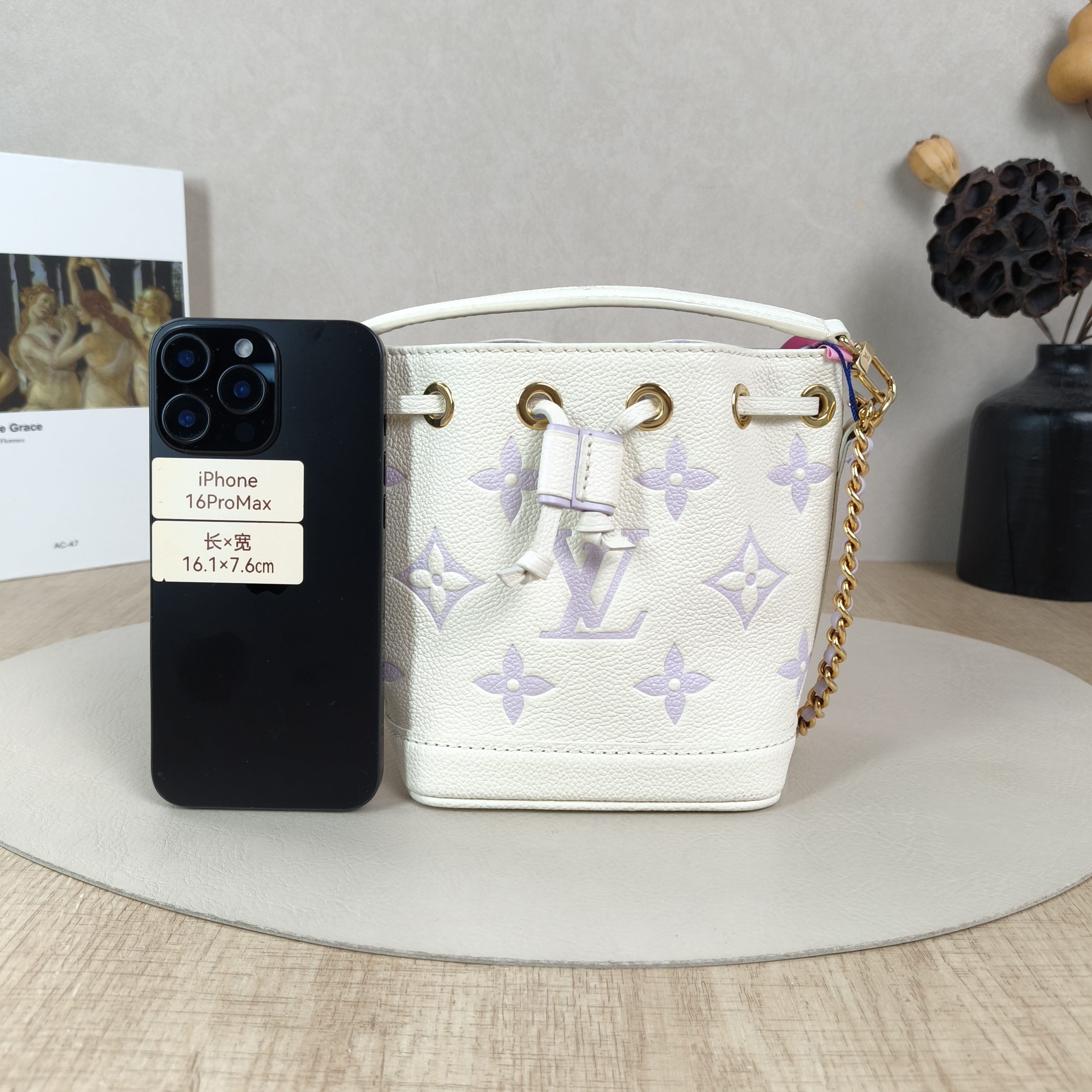 Louis Vuitton Crossbody Bag NANO NOÉ Bucket Bag Nano White · Empreinte Embossed Calfskin Monogramnano13 × 10 × 16 cm — cover view 2 of 5