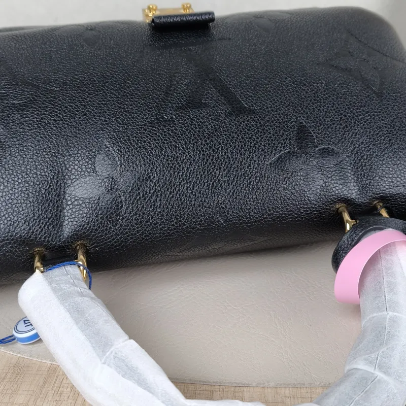 Louis Vuitton Crossbody Bag MADELEINE Black Monogram Empreinte Embossed Calfskin Medium 30 × 11 × 19.5 cm — detail view 4 of 11