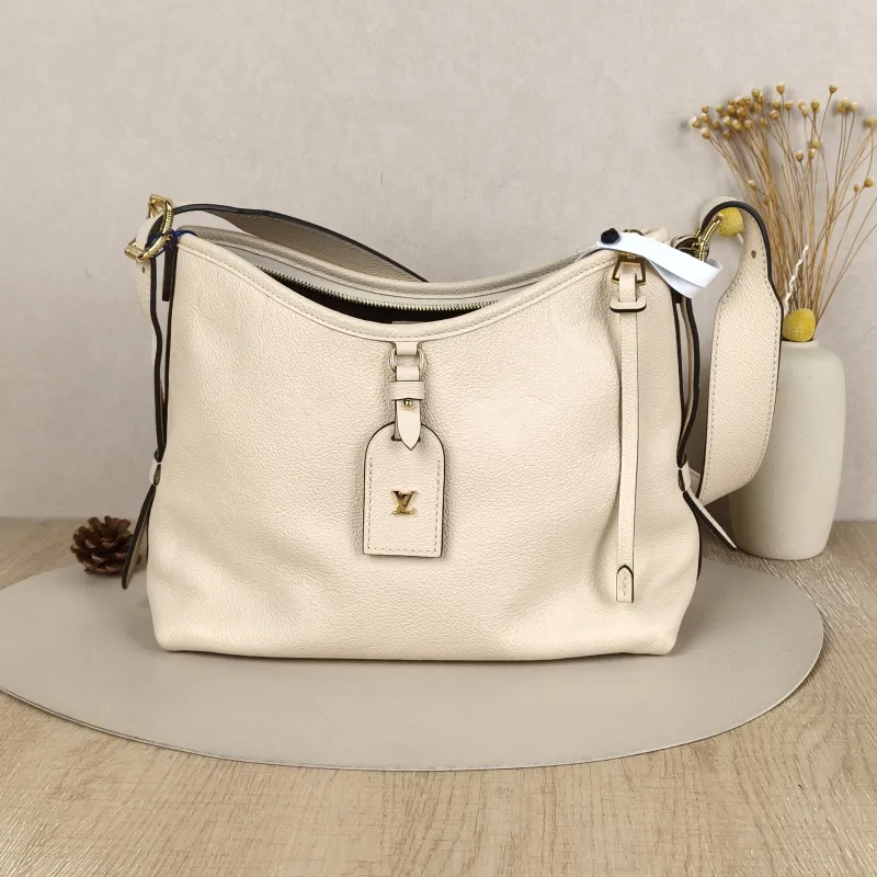 Louis Vuitton carryall Small White Calfskin Microchip Edition · Shoulder Strap Inner Pouch Leather Tag · 29.5 × 12 × 24 cm