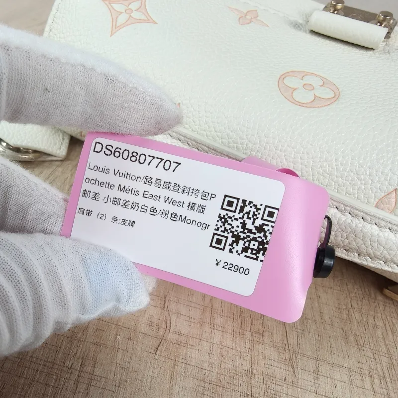 Louis Vuitton Crossbody Bag Pochette Métis East West White · Pink Monogram Empreinte Embossed Calfskin Small21.5 × 6 × 13.5 cm — detail view 11 of 13