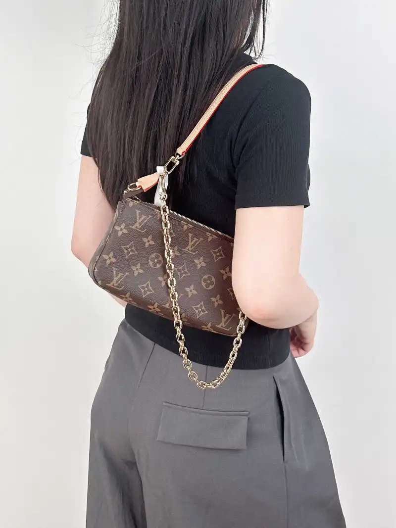 Louis Vuitton Shoulder Bag Pochette Accessoires Two Straps Monogram PVC Large 23.5 × 4 × 13.5 cm — on-model view 1 of 3