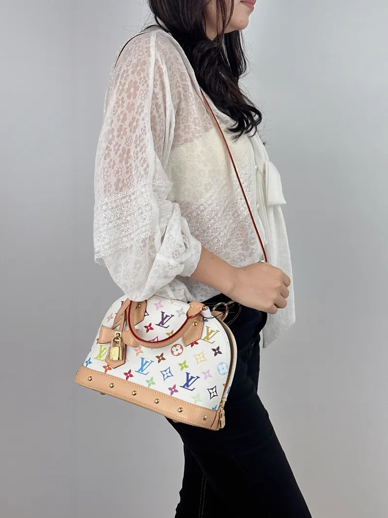 Louis Vuitton Crossbody Bag Alma BB Multicolore PVC BB 23.5 × 11.5 × 17.5 cm — on-model view 1 of 2