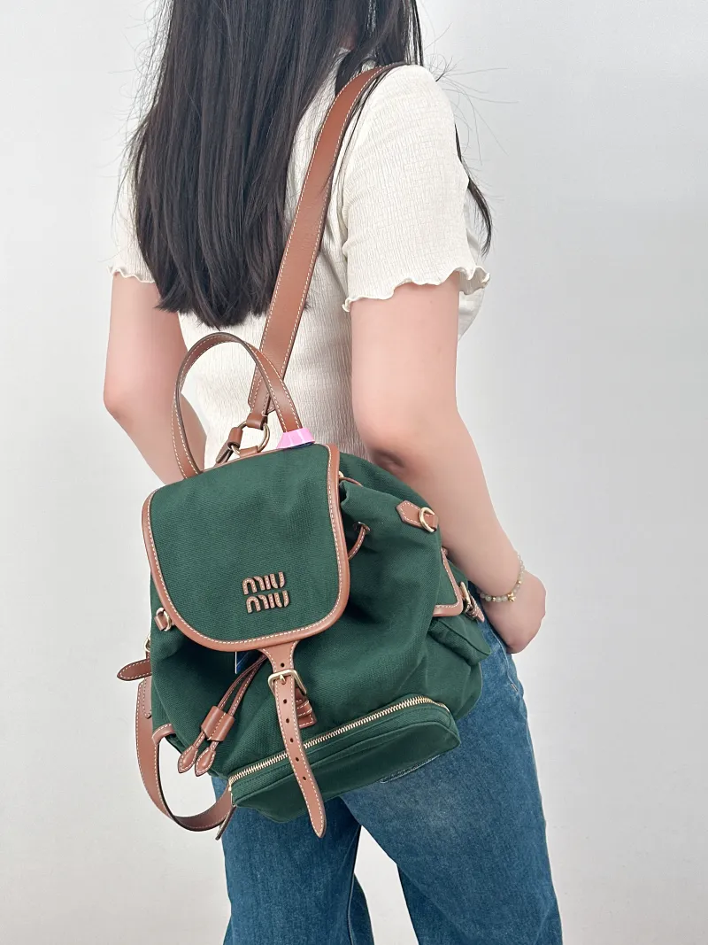 Miumiu Backpack Backpack Green Canvas Large25 × 14 × 25 cm — on-model view 1 of 3